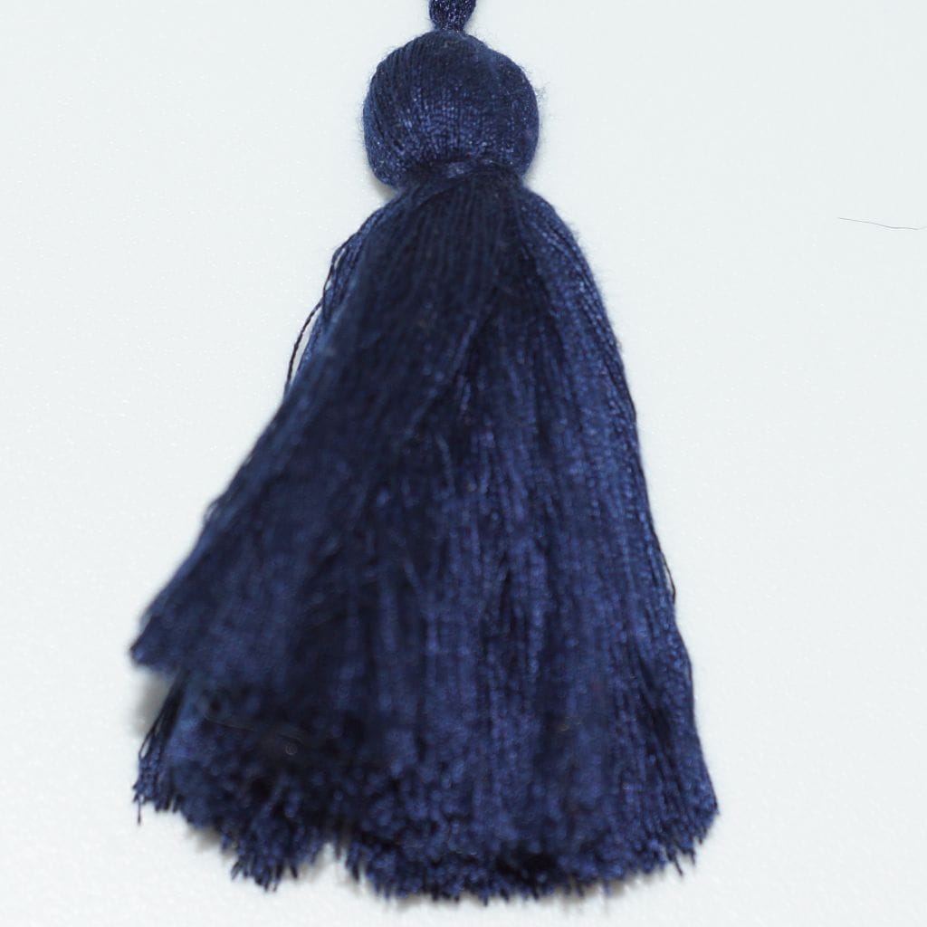 Uni obdélníkový polštář s bambulkami - 40x60 cm